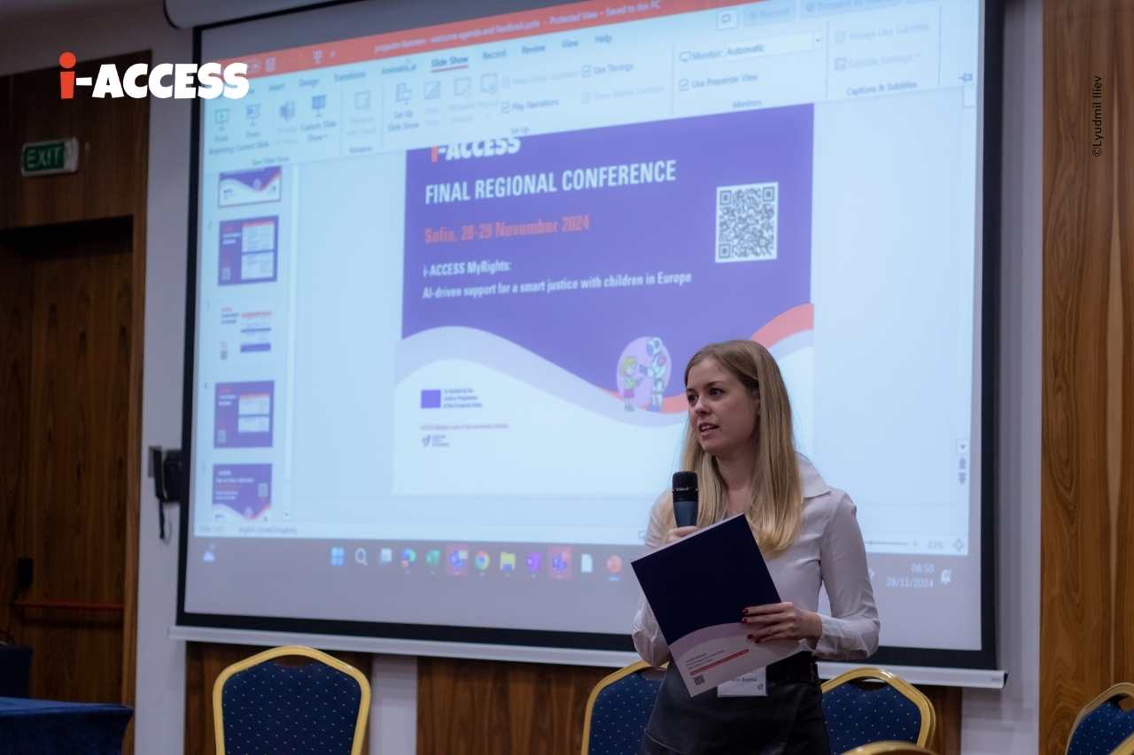 Fanni SOMFAI welcoming the audience at the i-ACCESS conference
