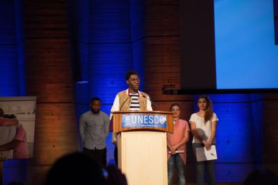 Person speaking at conference